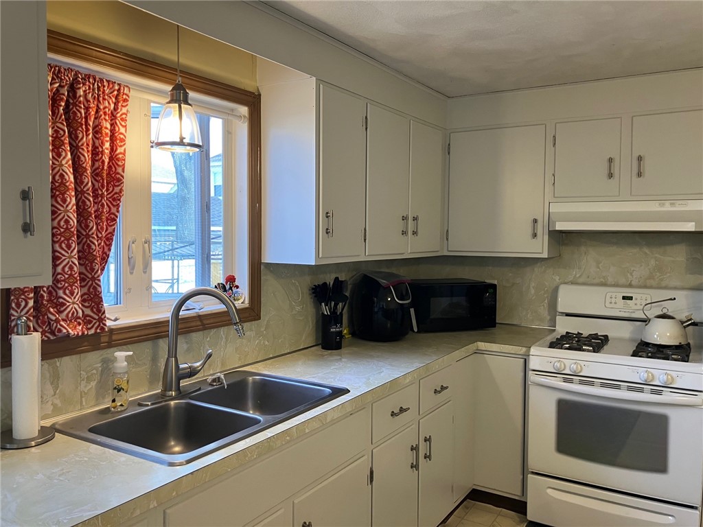 45 Perrin Avenue Pawtucket, RI 02861 - Photo 12 of 33 Light, bright kitchen with plenty of counter space