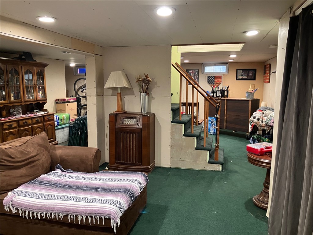 45 Perrin Avenue Pawtucket, RI 02861 - Photo 30 of 33 This well-lit with its recessed lighting and expansive area offers ample room for comfortable living and entertaining