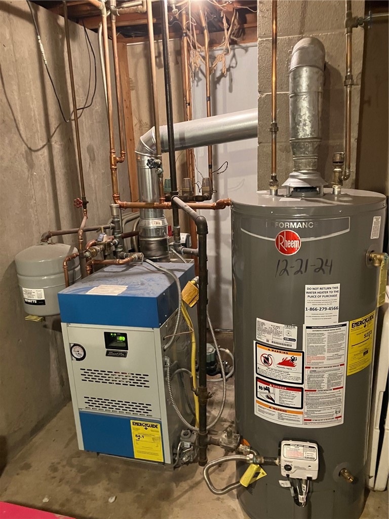 45 Perrin Avenue Pawtucket, RI 02861 - Photo 32 of 33 Young boiler and very young hot water tank