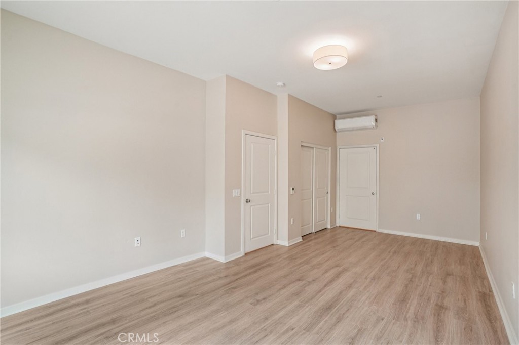 143 Frame Irvine, CA 92618 - Photo 21 of 41 a view of wooden floor and windows in a room