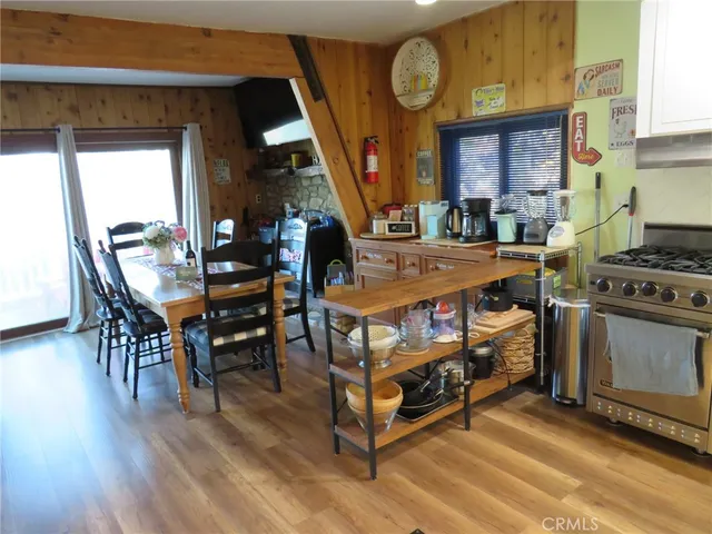 a view of a balcony with wooden fence