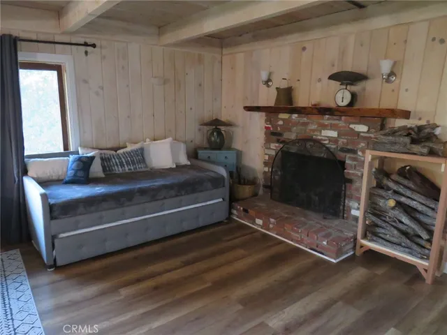 a bathroom with a granite countertop sink and mirror