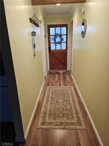 a room with furniture and wooden floor