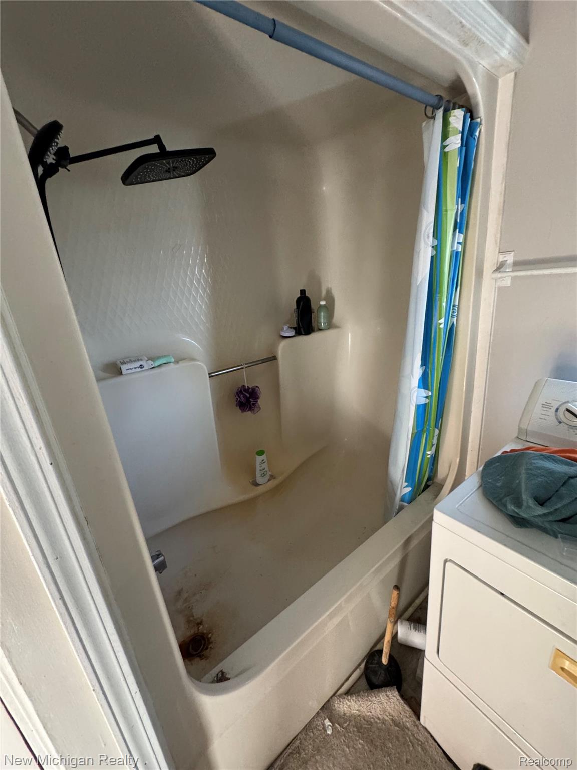 305 East Rolfe Street Perry, MI 48872 - Photo 6 of 19 Full bathroom with washer / dryer and shower / bathtub combination with curtain