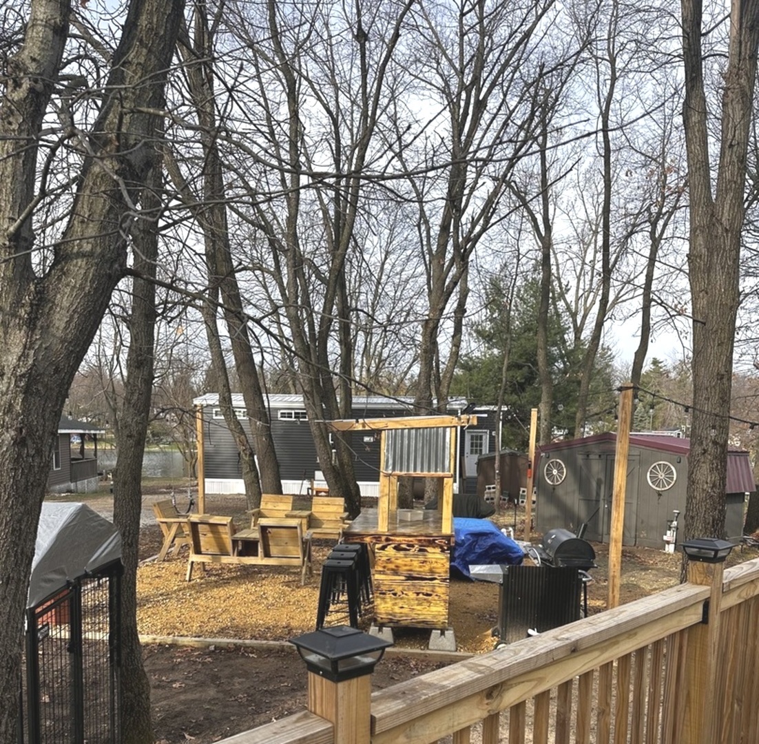 5-464 Woodhaven Lakes Sublette, IL 61367 - Photo 13 of 48 a view of outdoor space with seating area