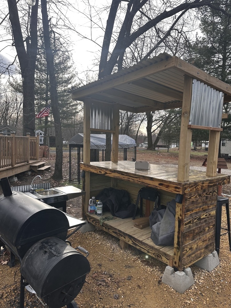 5-464 Woodhaven Lakes Sublette, IL 61367 - Photo 15 of 48 a backyard of a house with outdoor seating