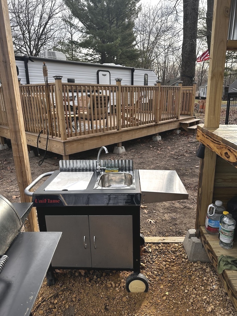 5-464 Woodhaven Lakes Sublette, IL 61367 - Photo 16 of 48 a view of backyard with deck and outdoor seating