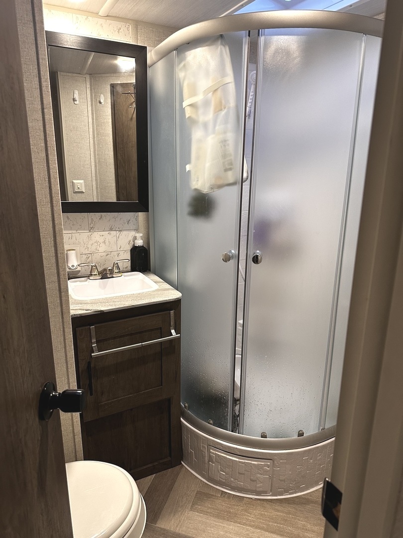 5-464 Woodhaven Lakes Sublette, IL 61367 - Photo 23 of 48 a bathroom with a sink toilet and shower