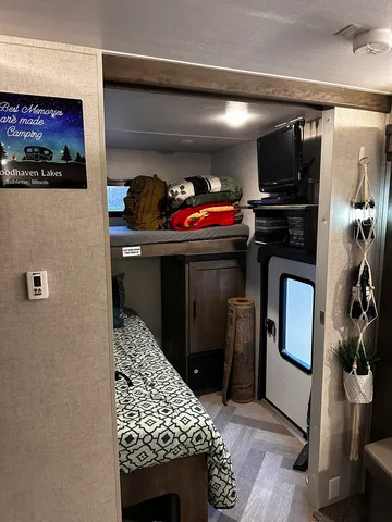 a kitchen with kitchen island a sink and a stove