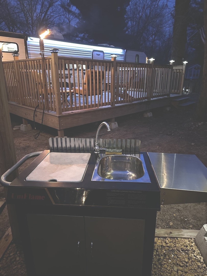5-464 Woodhaven Lakes Sublette, IL 61367 - Photo 27 of 48 a kitchen with kitchen island a sink and a stove