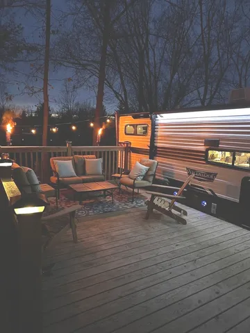 a view of a yard with a tiny house