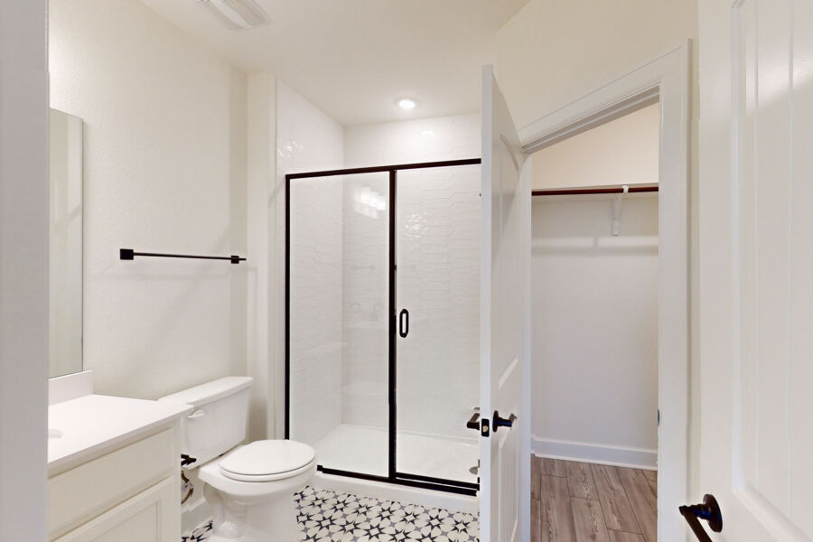 3825 Waxahachie Road Leander, TX 78641 - Photo 13 of 40 a bathroom with a shower toilet and sink