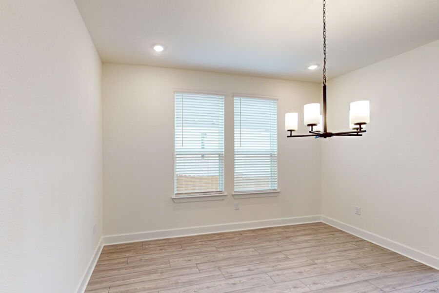 3825 Waxahachie Road Leander, TX 78641 - Photo 15 of 40 a view of empty room with wooden floor fan and window