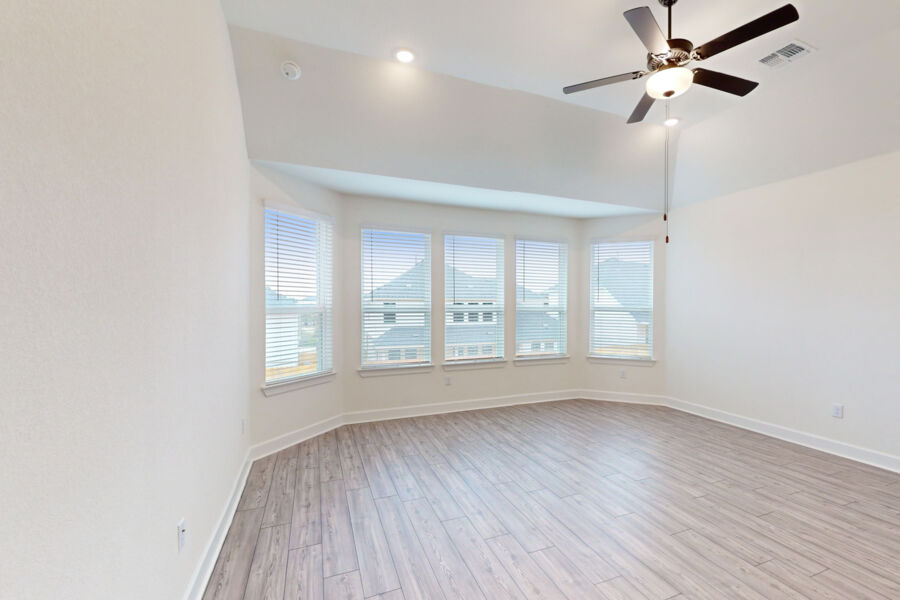 3825 Waxahachie Road Leander, TX 78641 - Photo 16 of 40 a view of an empty room with a window and wooden floor