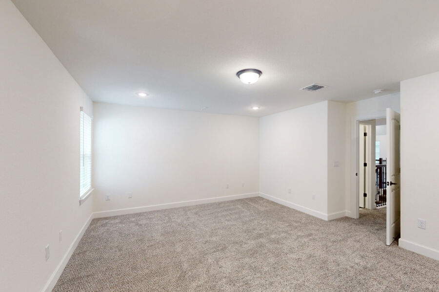 3825 Waxahachie Road Leander, TX 78641 - Photo 23 of 40 an empty room with a natural light