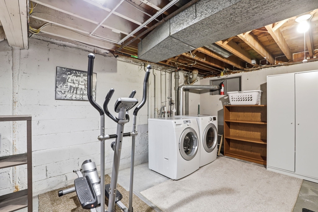 86 Durham Road, Unit 86 Dedham, MA 02026 - Photo 23 of 26 a utility room with dryer and washer