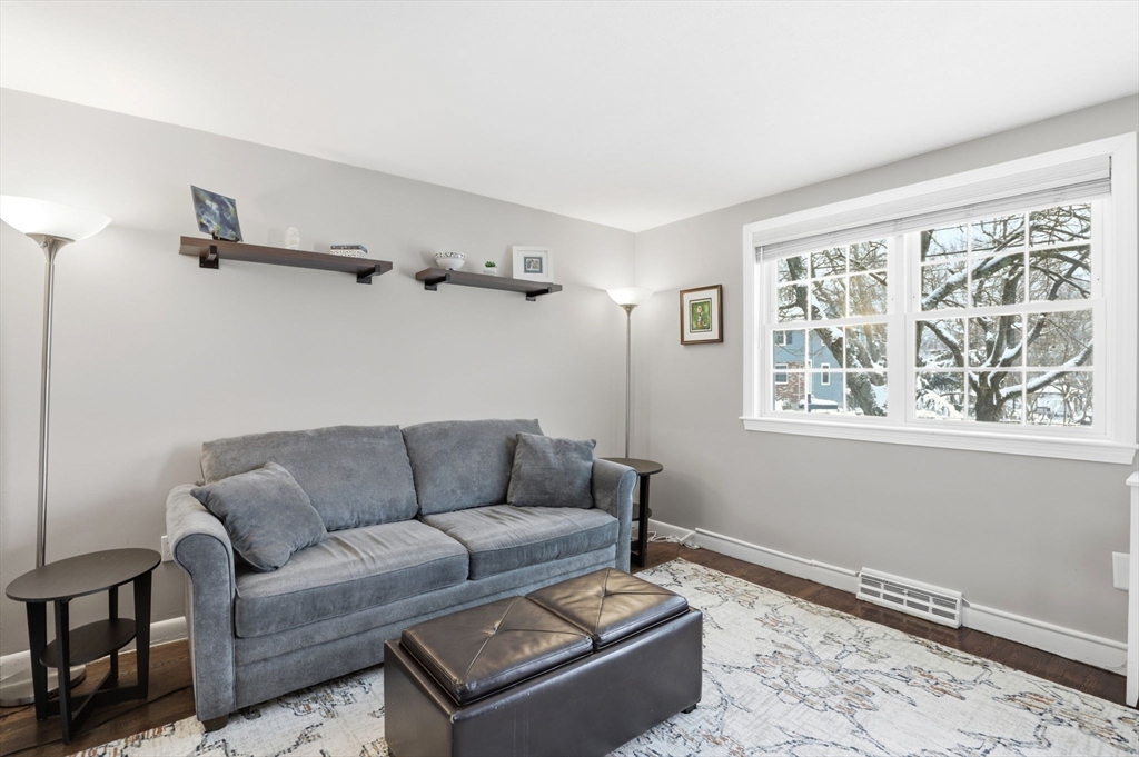 86 Durham Road, Unit 86 Dedham, MA 02026 - Photo 8 of 26 a living room with furniture and a window