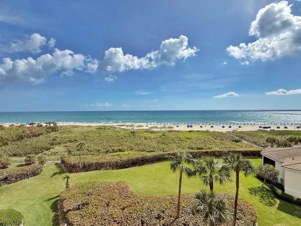 a view of a ocean with beach