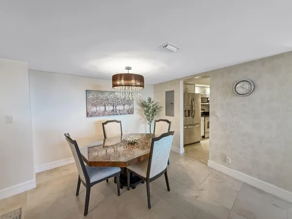 a view of a dining room with furniture