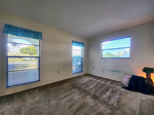 a view of a livingroom with a patio and a dishwasher