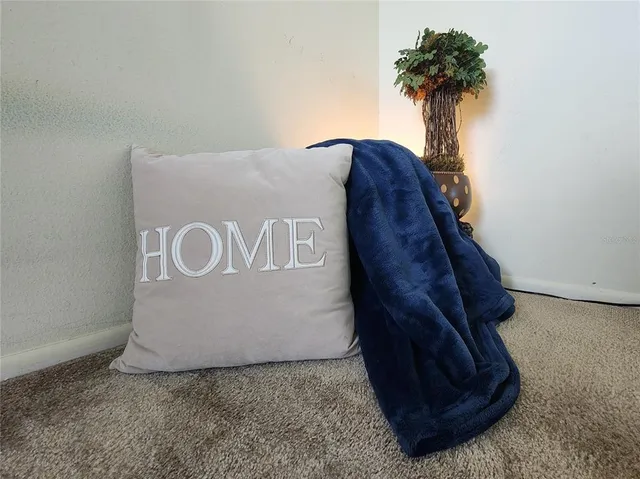 a view of empty room with windows