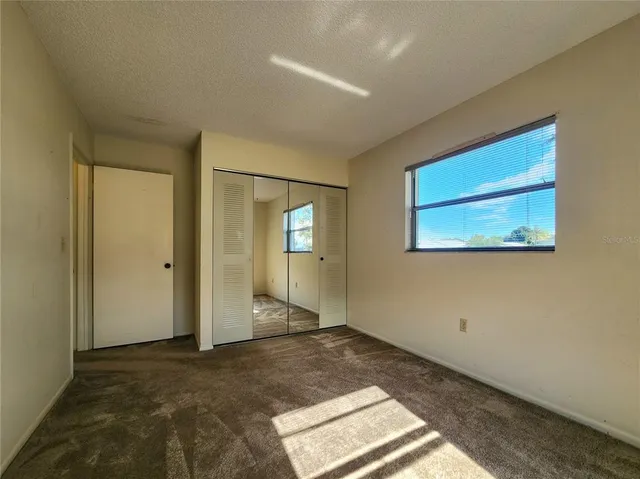 a view of a room with rack on the wall