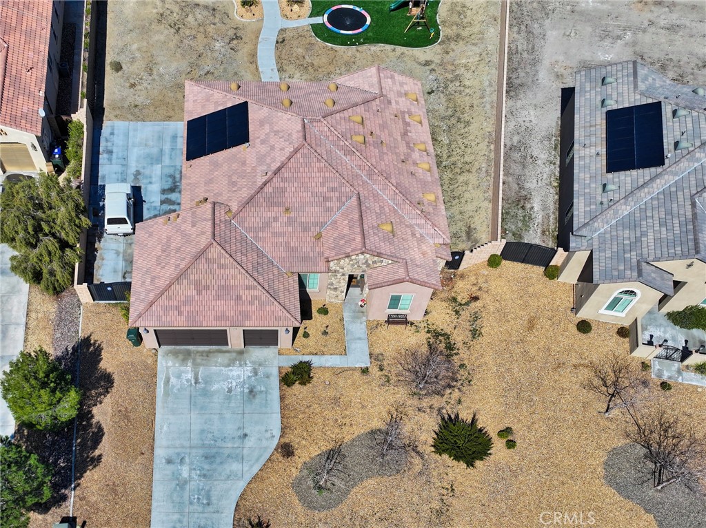 19520 Arcata Road Apple Valley, CA 92307 - Photo 2 of 53 an aerial view of a house with a yard