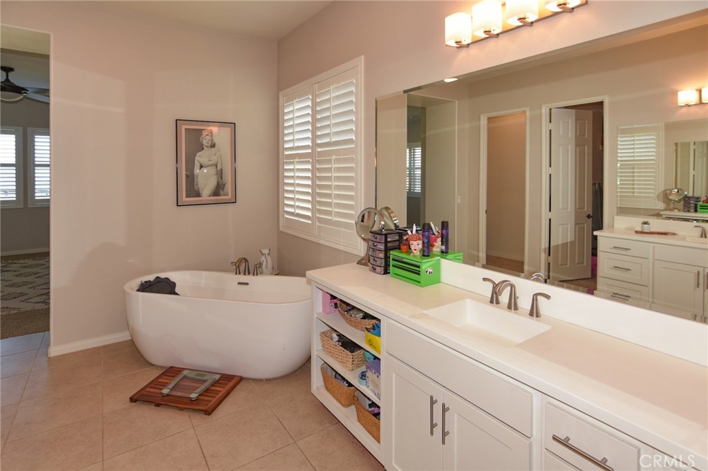 19520 Arcata Road Apple Valley, CA 92307 - Photo 22 of 53 a bathroom with a sink mirror and window