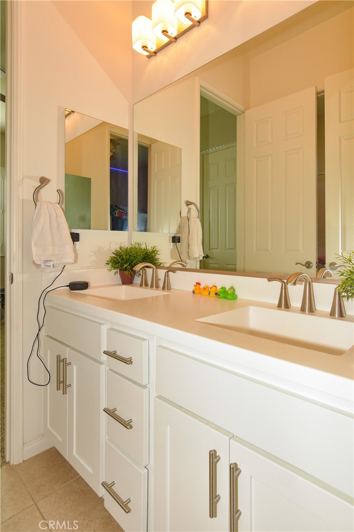 19520 Arcata Road Apple Valley, CA 92307 - Photo 31 of 53 a bathroom with a sink and a mirror