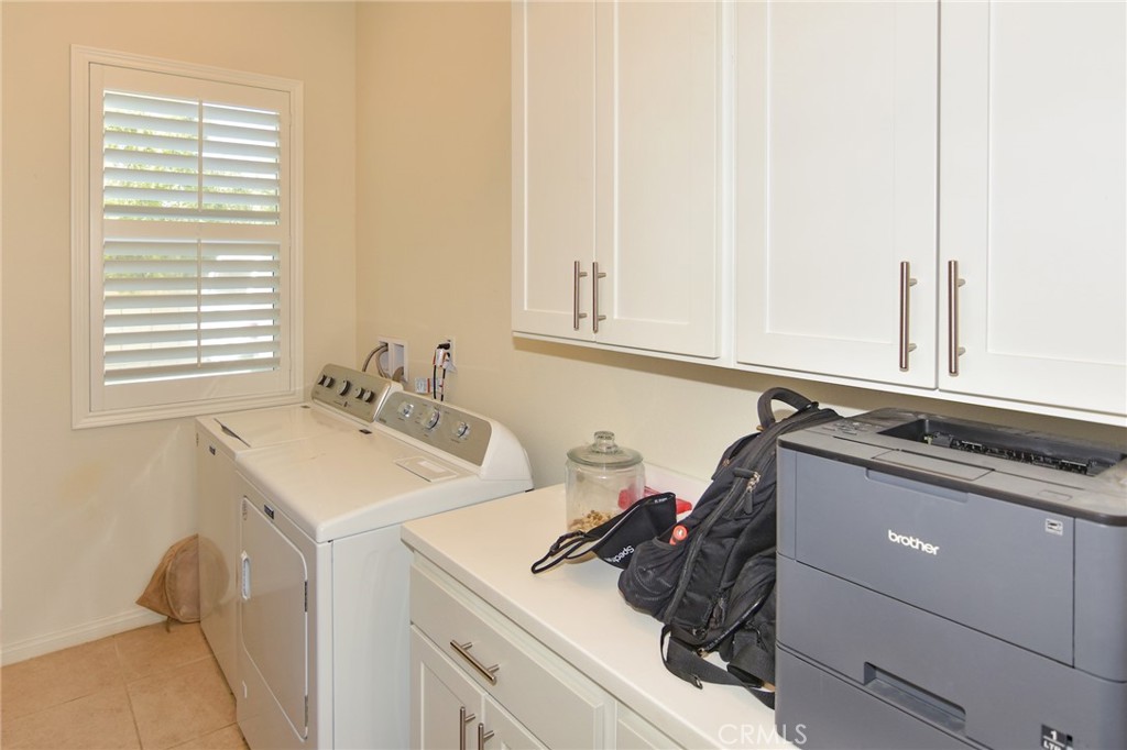 19520 Arcata Road Apple Valley, CA 92307 - Photo 37 of 53 a utility room with sink dryer and washer