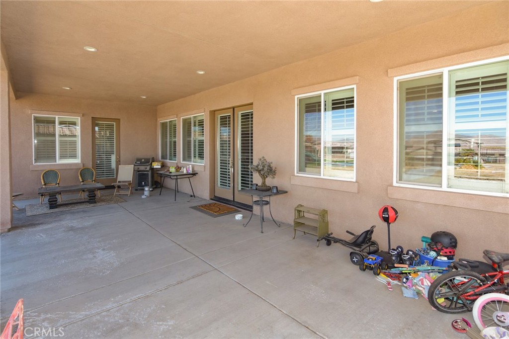 19520 Arcata Road Apple Valley, CA 92307 - Photo 46 of 53 a living room with furniture and windows