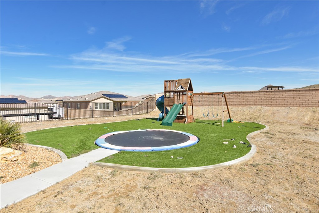 19520 Arcata Road Apple Valley, CA 92307 - Photo 51 of 53 a view of a swimming pool with a yard