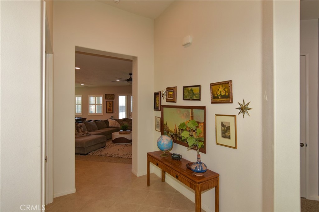19520 Arcata Road Apple Valley, CA 92307 - Photo 6 of 53 a view of a livingroom with furniture and a hallway