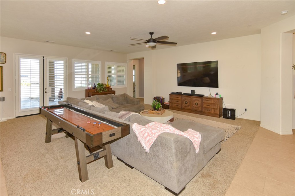 19520 Arcata Road Apple Valley, CA 92307 - Photo 8 of 53 a living room with furniture and a flat screen tv