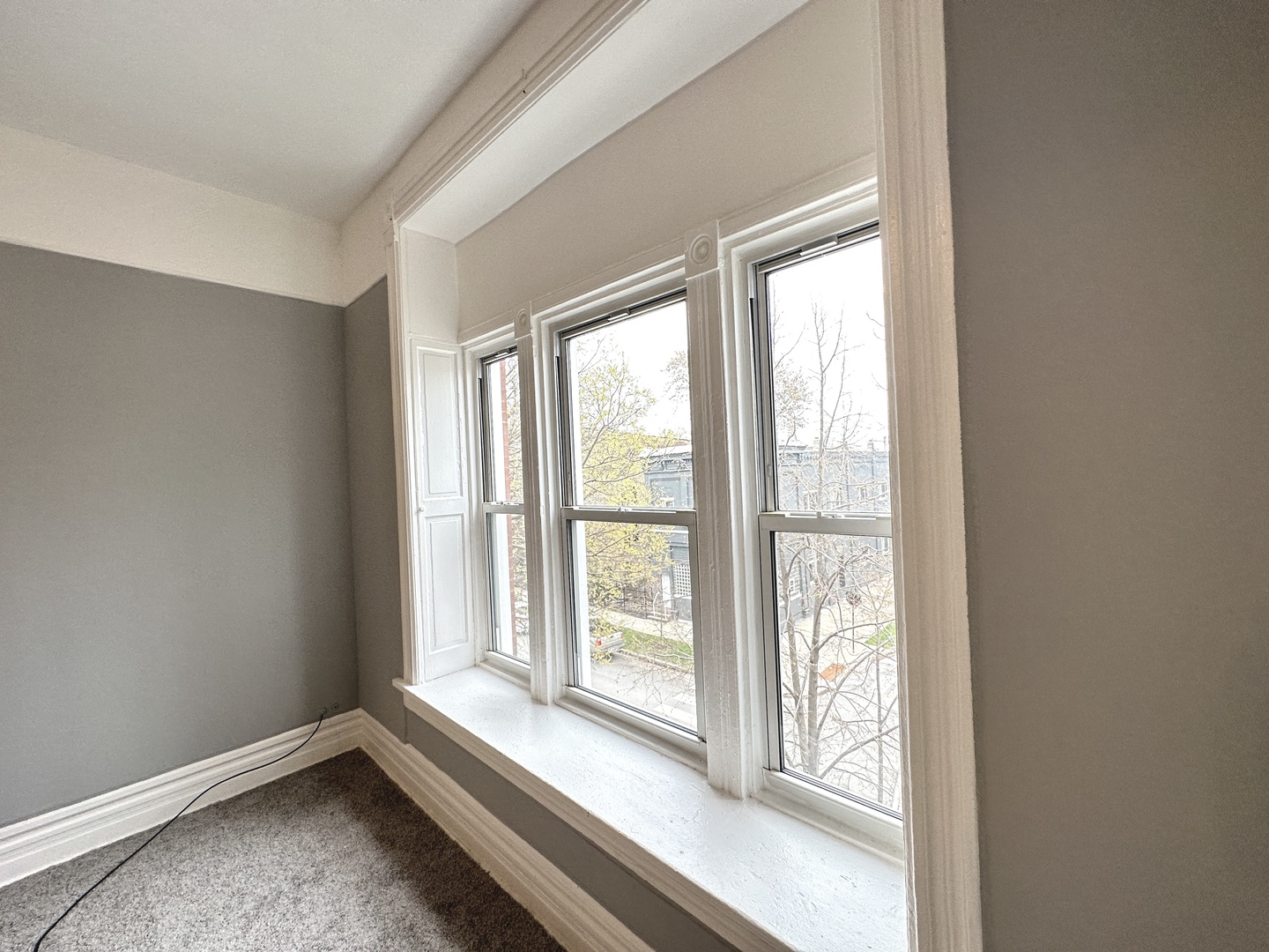 2730 West 16th Street Chicago, IL 60608 - Photo 12 of 14 a view of an empty room with a window