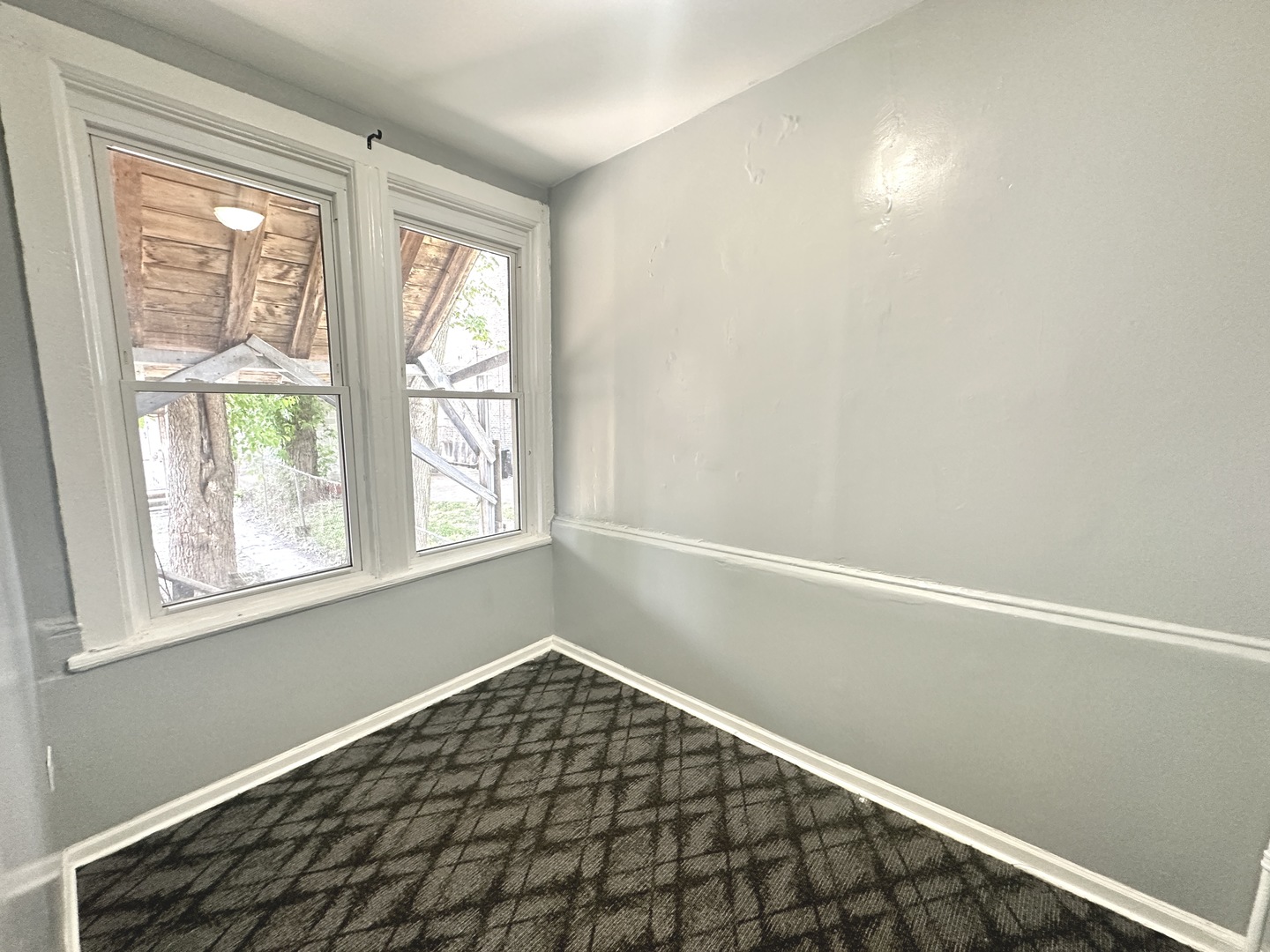 2730 West 16th Street Chicago, IL 60608 - Photo 6 of 14 a view of an empty room with a window