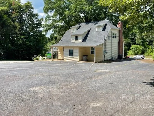a front view of a house with a garage