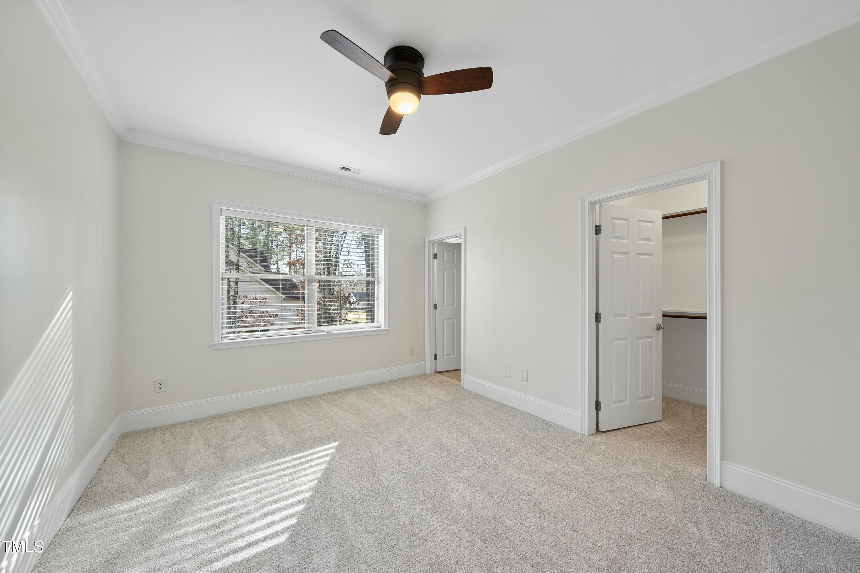 7220 Hasentree Way Wake Forest, NC 27587 - Photo 23 of 39 a view of an empty room with a window