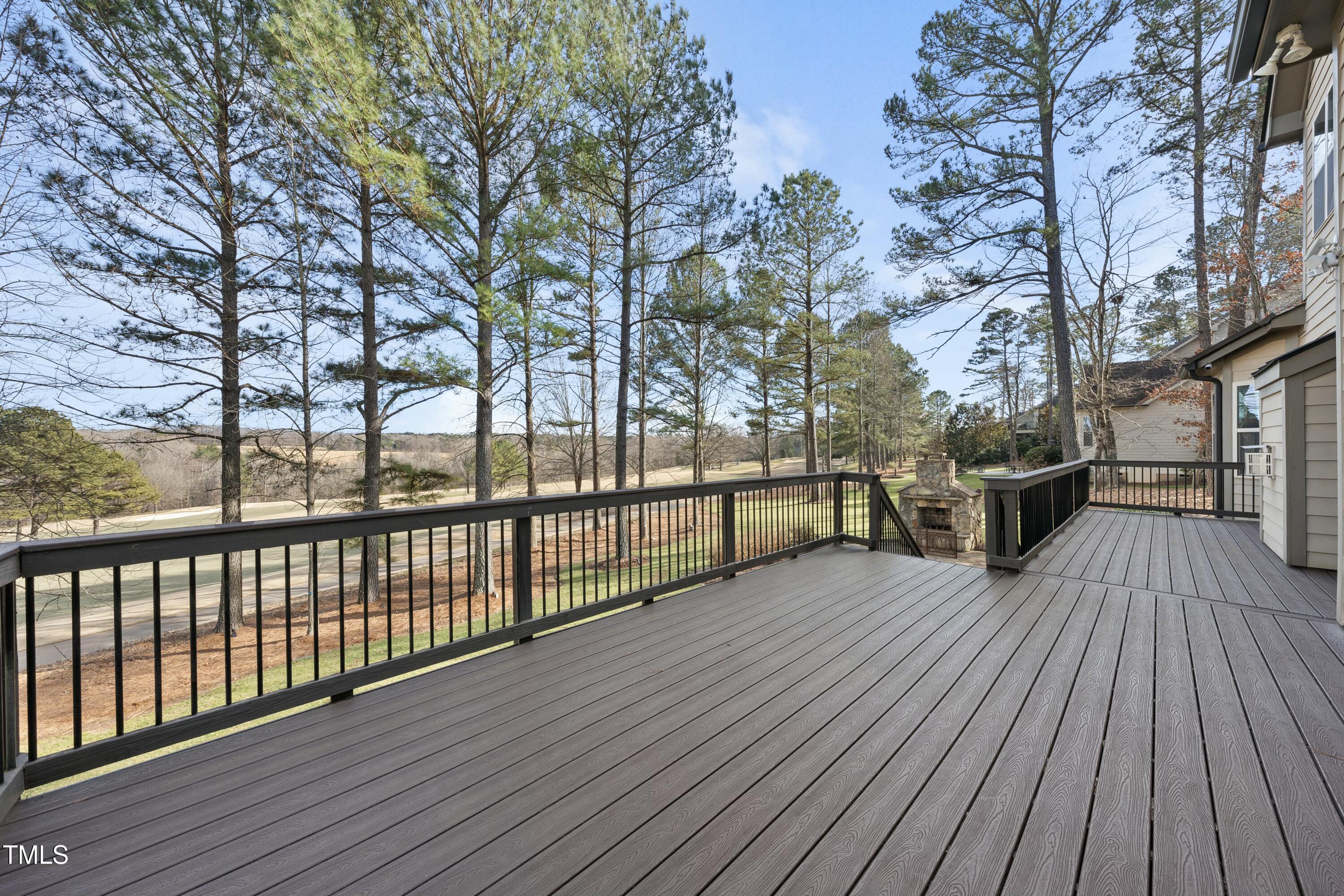 7220 Hasentree Way Wake Forest, NC 27587 - Photo 29 of 39 a view of a wooden deck with a yard