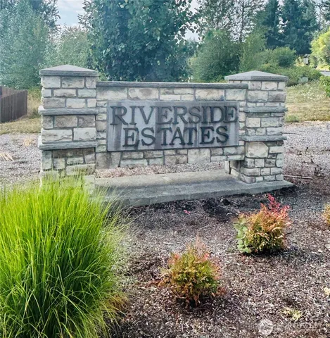 a view of a street with some trees