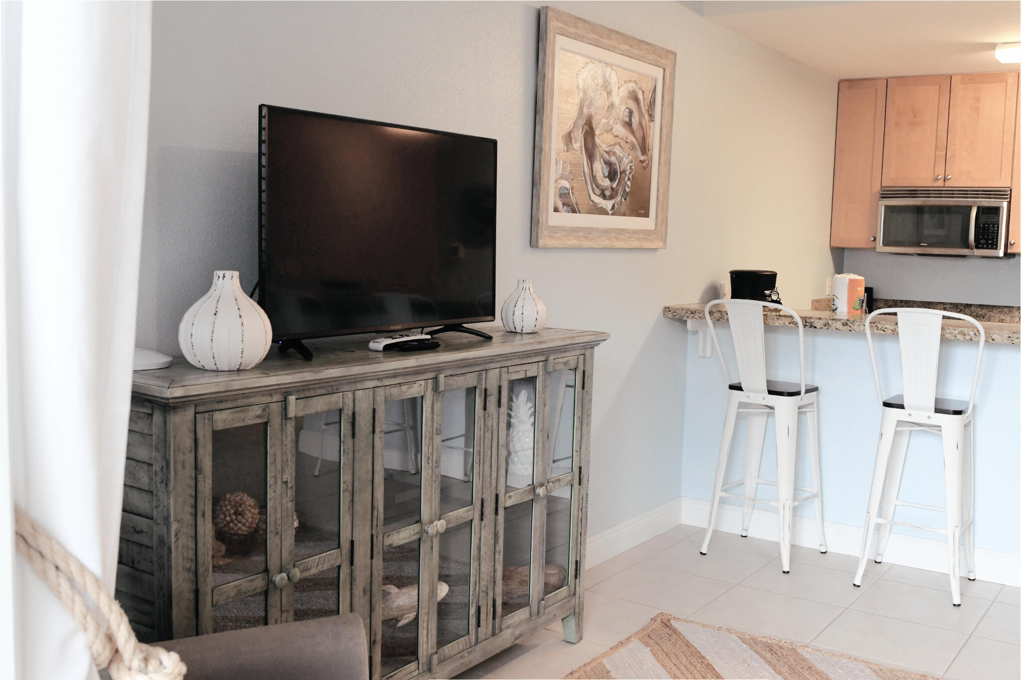 43 Cassine Way, Unit 202 Santa Rosa Beach, FL 32459 - Photo 14 of 25 a living room with furniture and a flat screen tv