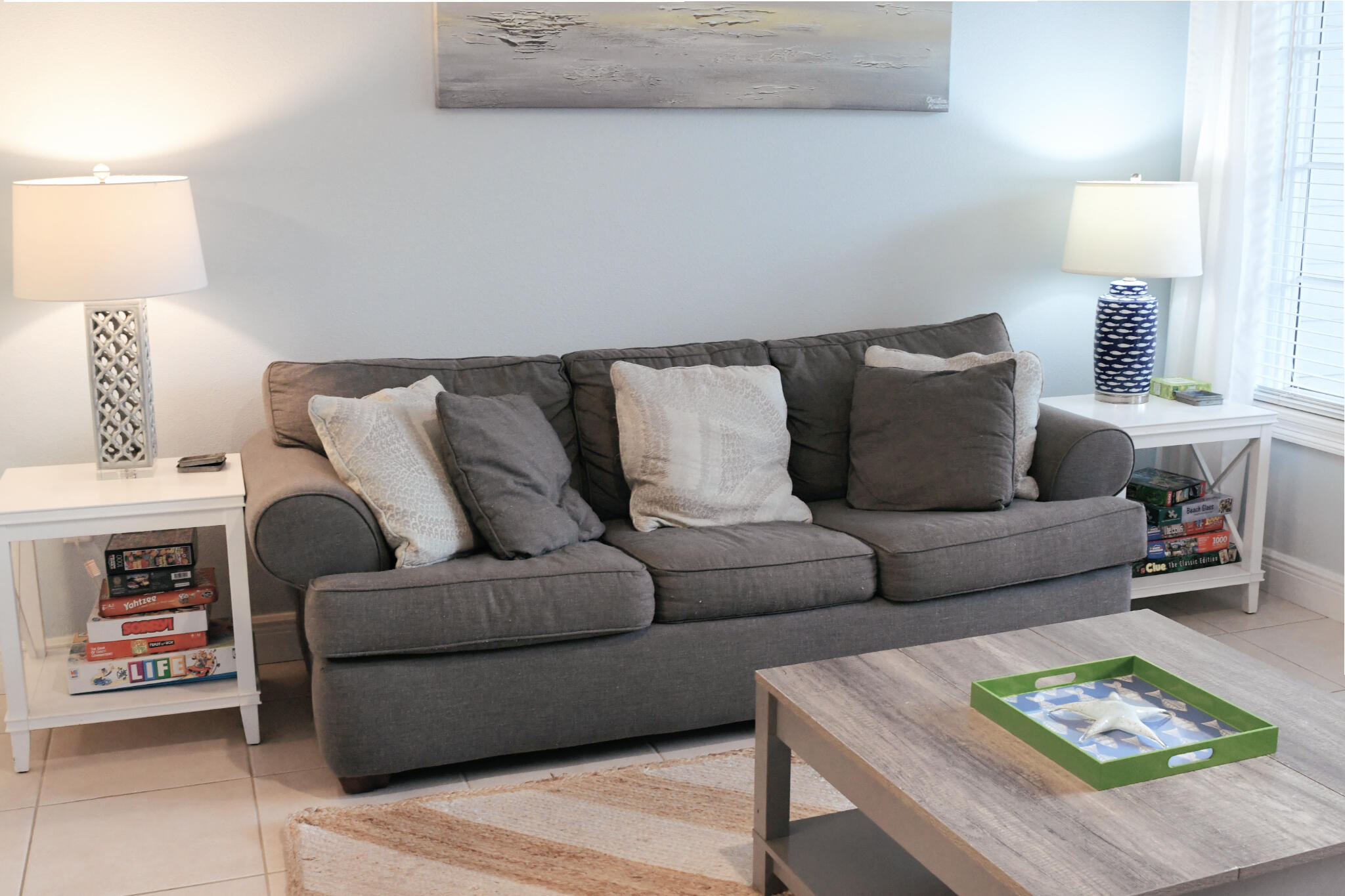 43 Cassine Way, Unit 202 Santa Rosa Beach, FL 32459 - Photo 16 of 25 a living room with furniture and a lamp