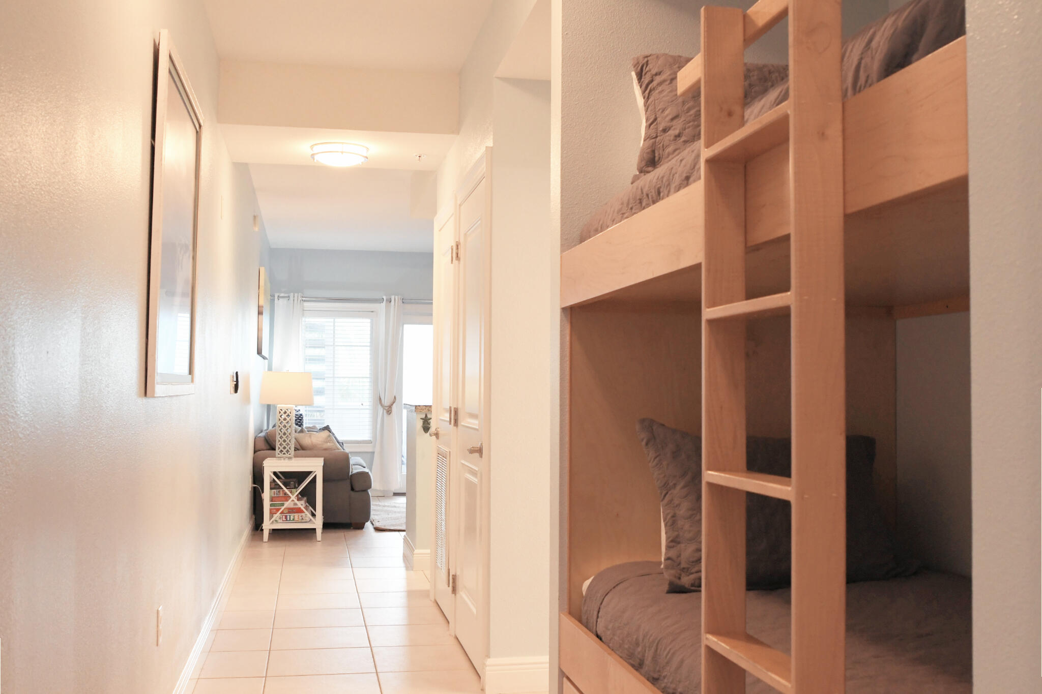 43 Cassine Way, Unit 202 Santa Rosa Beach, FL 32459 - Photo 3 of 25 a view of a hallway with a livingroom and a bathroom