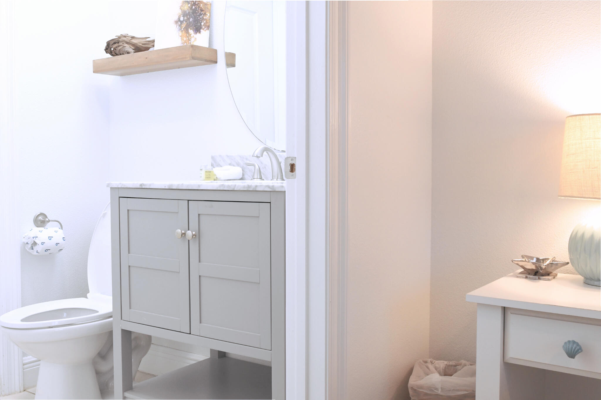 43 Cassine Way, Unit 202 Santa Rosa Beach, FL 32459 - Photo 6 of 25 a bathroom with a sink a toilet and vanity