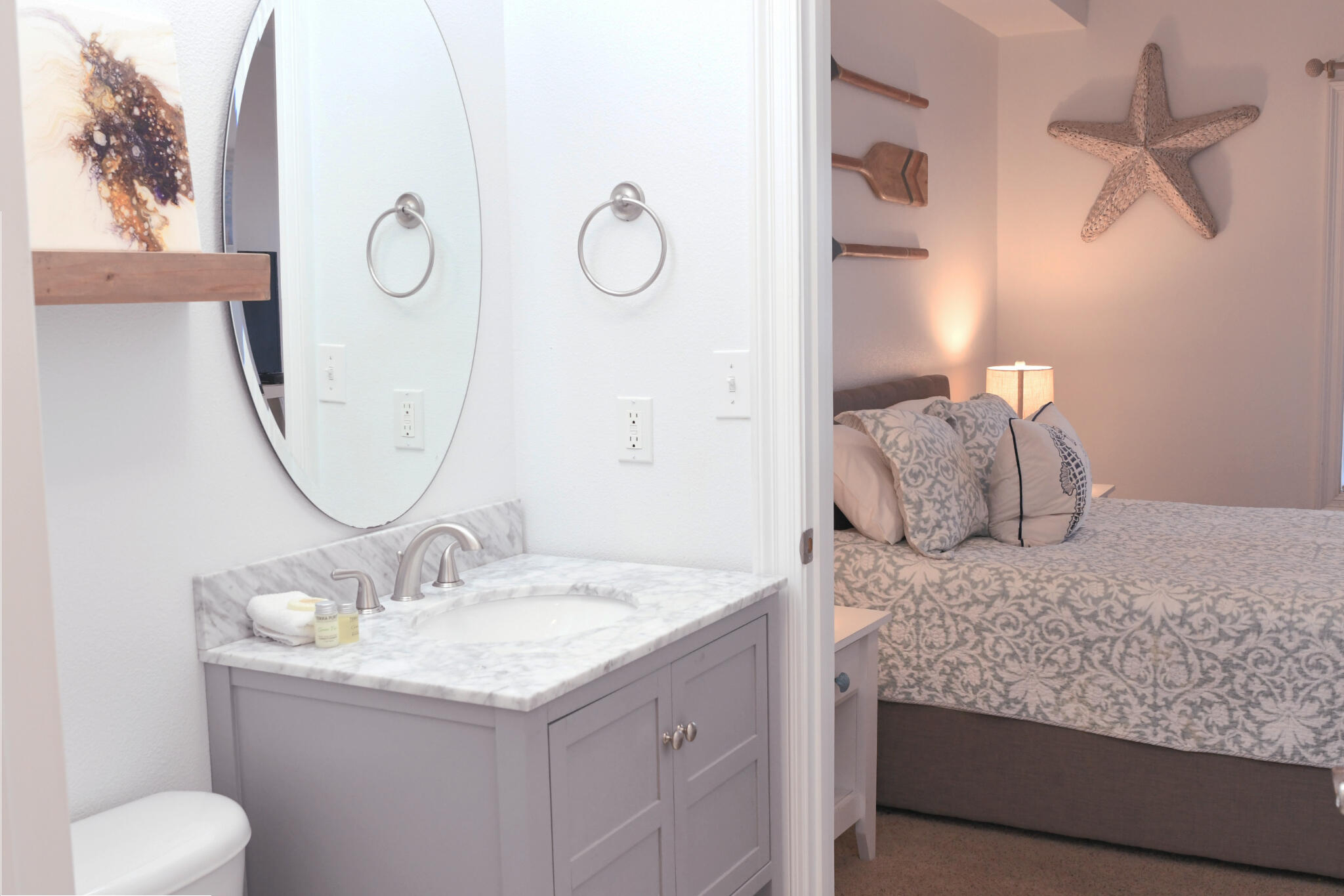 43 Cassine Way, Unit 202 Santa Rosa Beach, FL 32459 - Photo 7 of 25 a bathroom with a granite countertop sink and a mirror