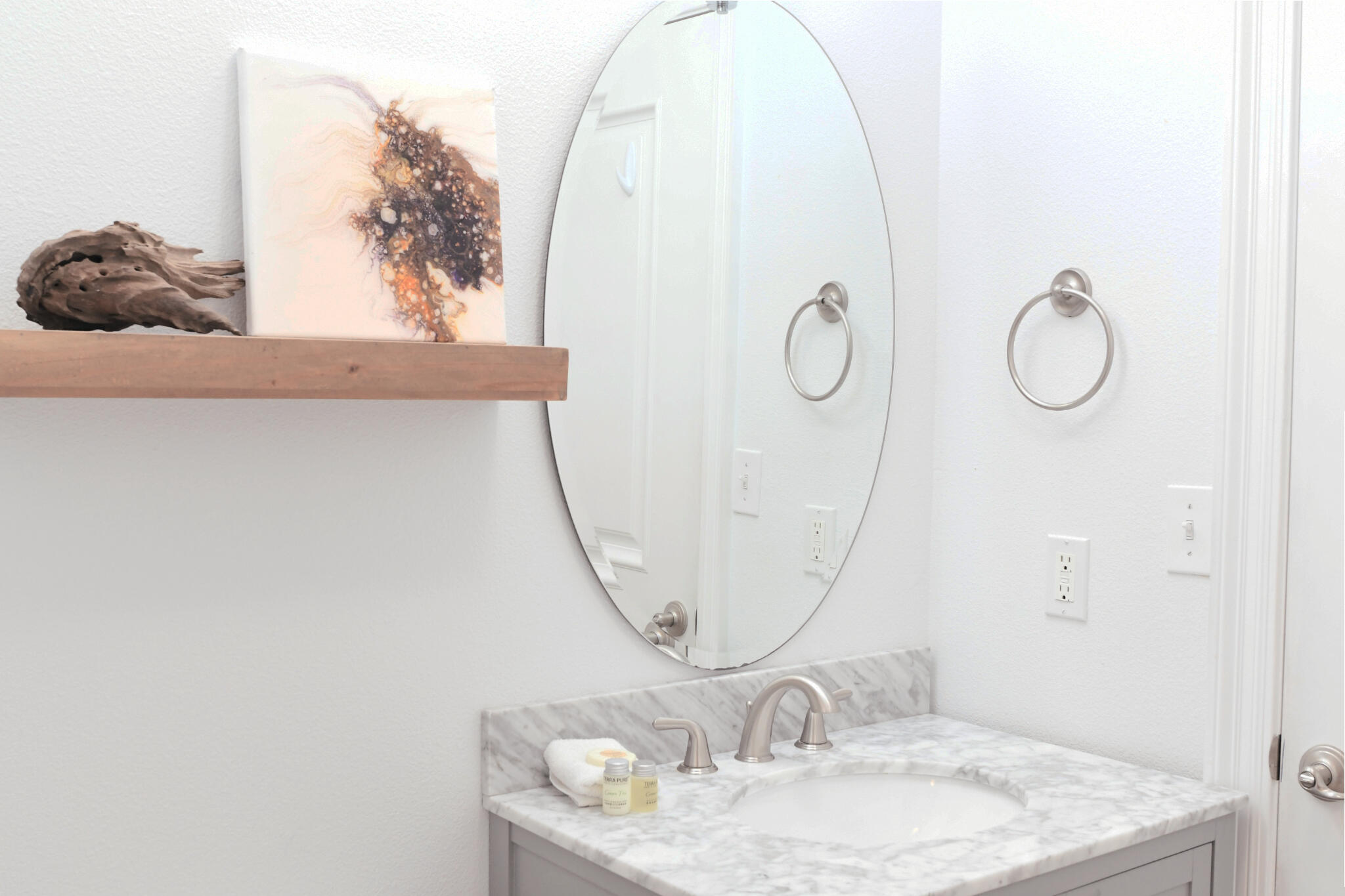 43 Cassine Way, Unit 202 Santa Rosa Beach, FL 32459 - Photo 8 of 25 a bathroom with a sink and mirror