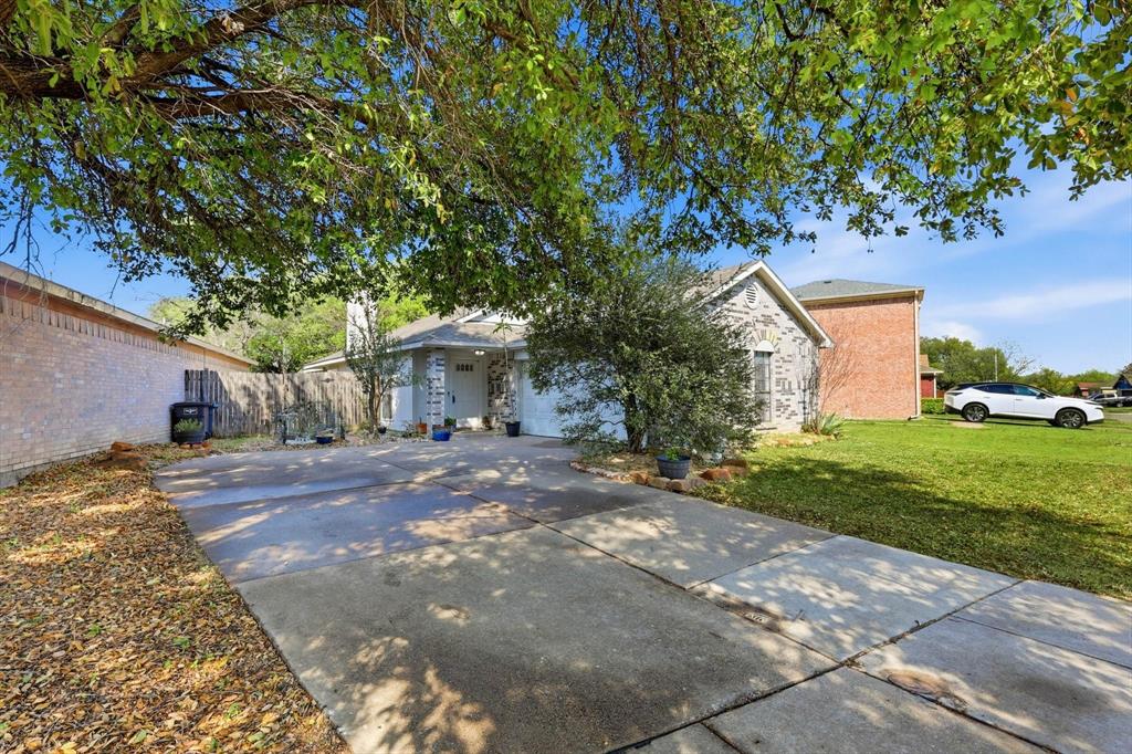 2532 Winding Road Fort Worth, TX 76133 - Photo 1 of 21 a view of a house with a yard and large tree