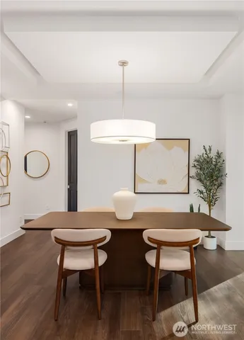 a living room with furniture a window and a table
