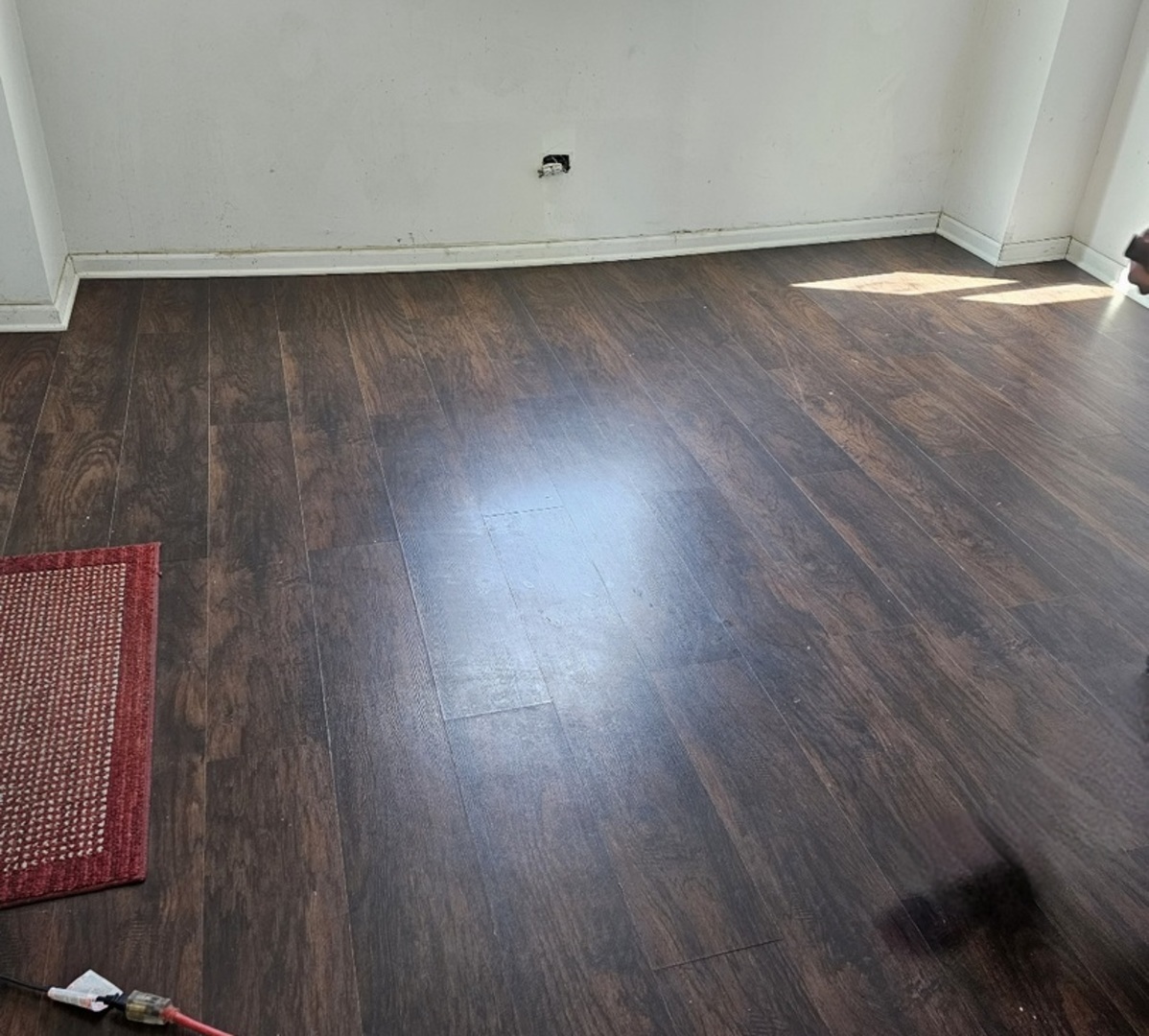 6004 South Aberdeen Street Chicago, IL 60621 - Photo 12 of 17 a view of a room with wooden floor