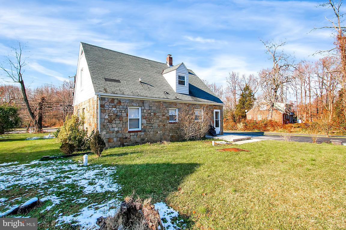 333 Back River Neck Road Baltimore, MD 21221 - Photo 22 of 25 front view of a house with a yard